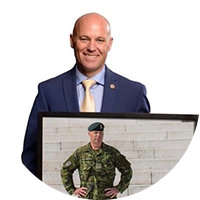 business man in suit holding a picture frame of himself in military uniform