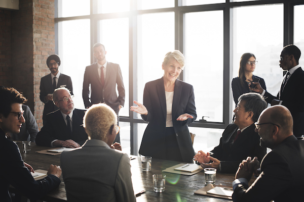 Group of professionals in a meeting interacting with each other